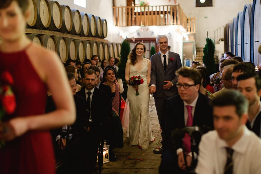 wedding ceremony in a wine cellar