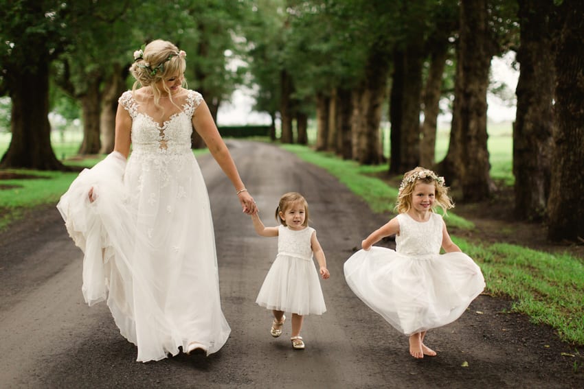 bride with flower girls