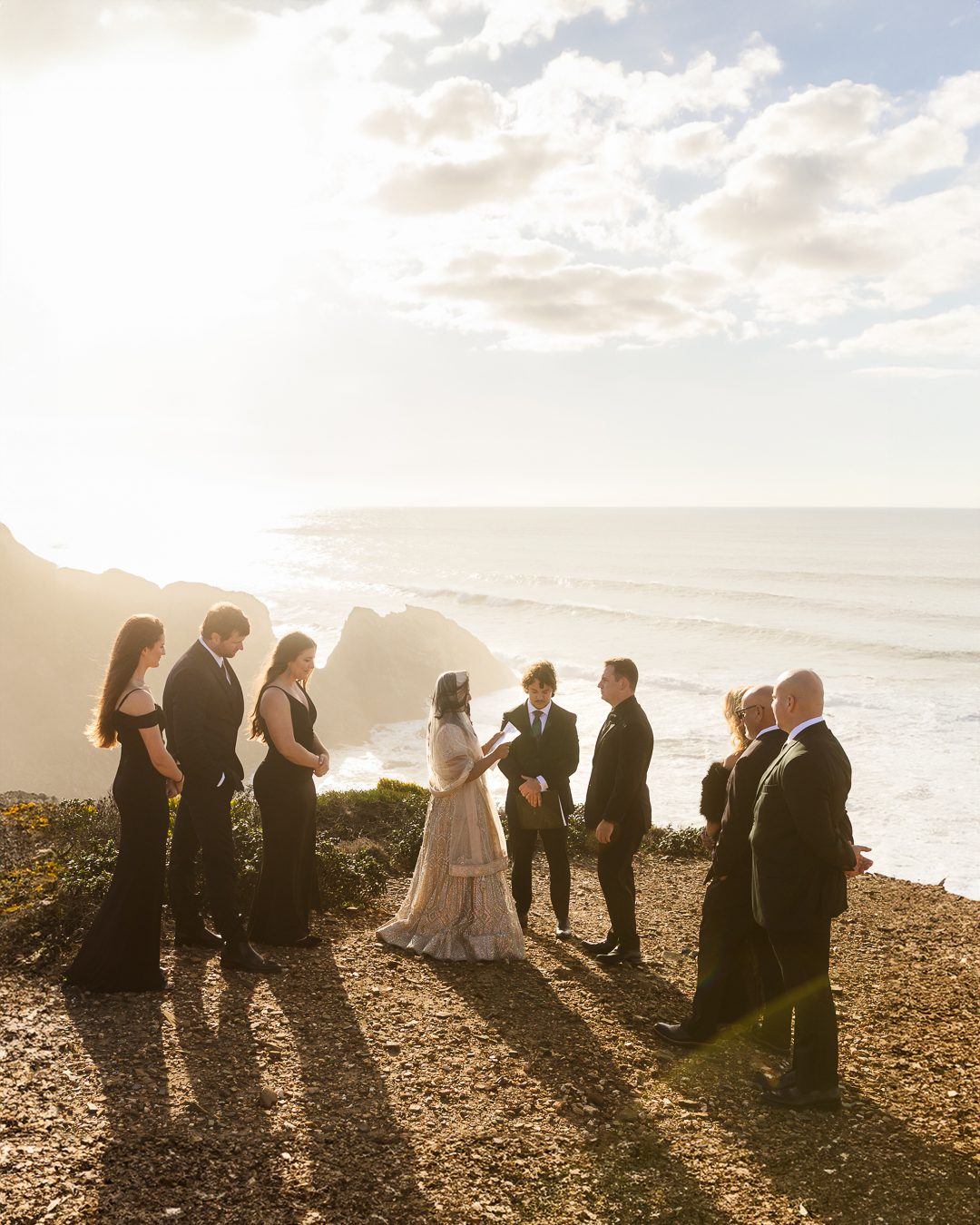 Bride and groom clifftop wedding ceremony on Algarve west coast, Portugal wedding photographer