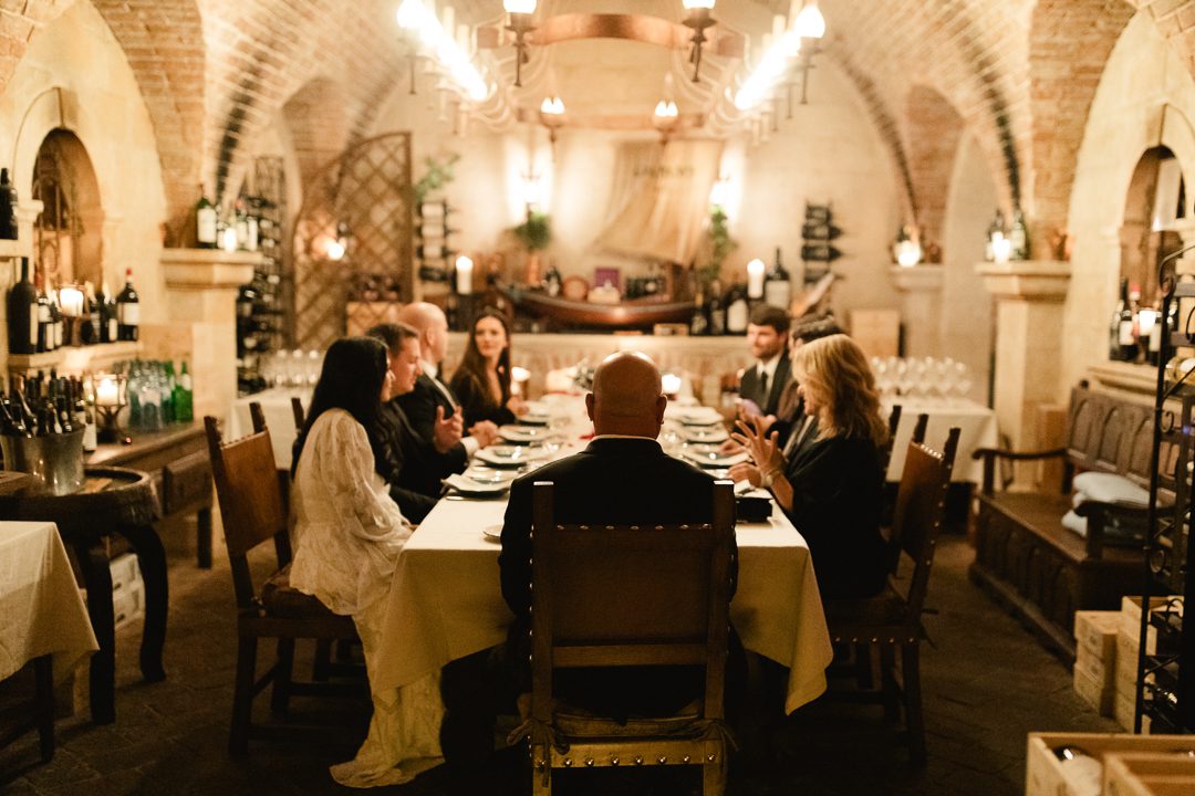 Intimate candlelit wine cellar reception Vila Vita Parc, Algarve elopement photographer