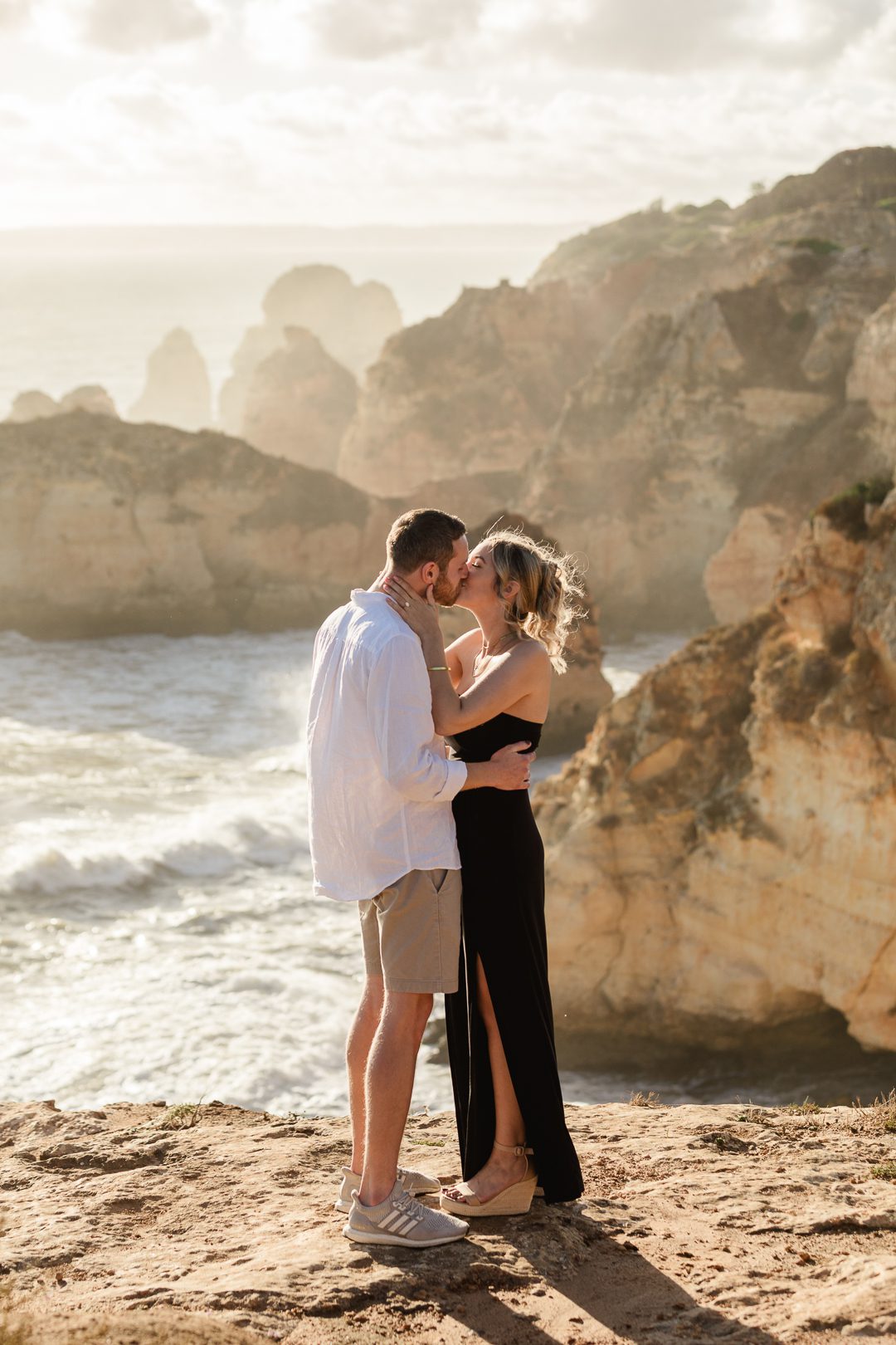 Rugged Algarve cliffs and Atlantic Ocean backdrop during a destination engagement proposal 