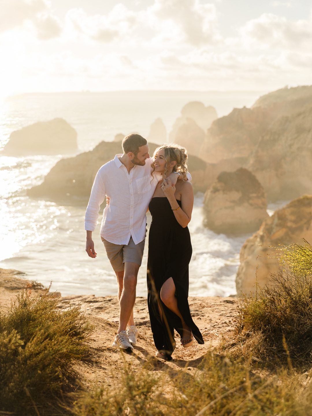 Rugged Algarve cliffs and Atlantic Ocean backdrop during a destination engagement proposal 
