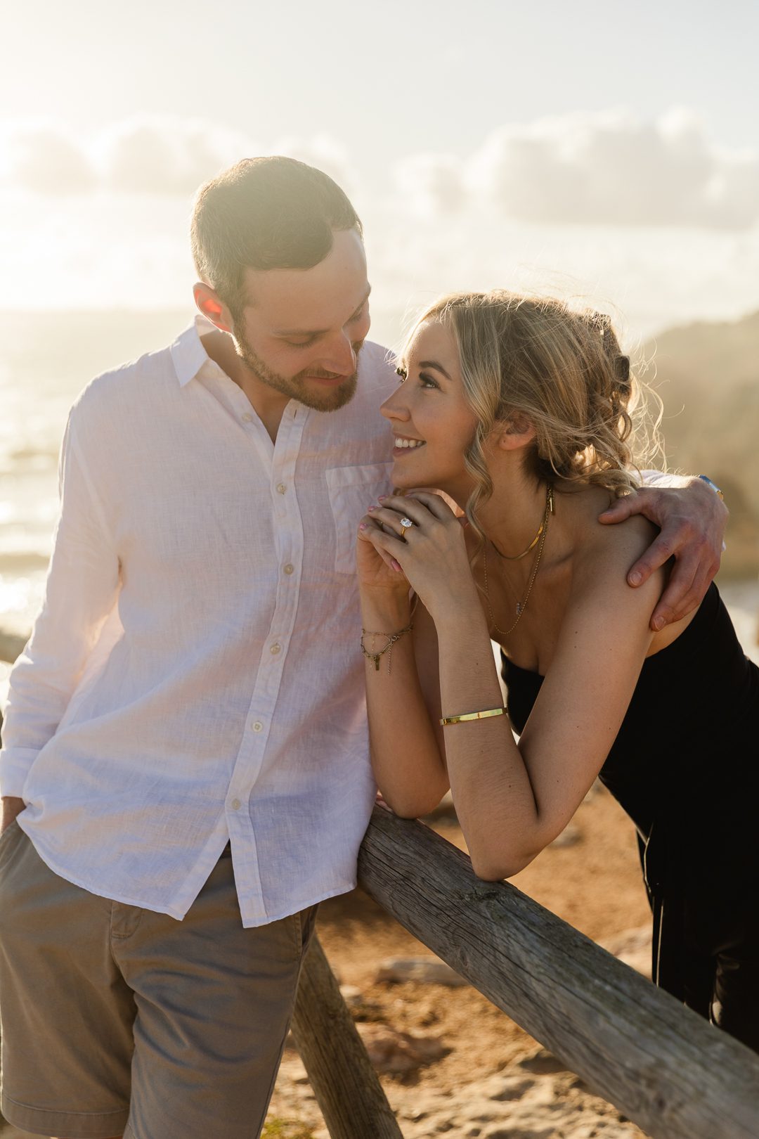 Playful beach engagement session in the Algarve after a surprise proposal 