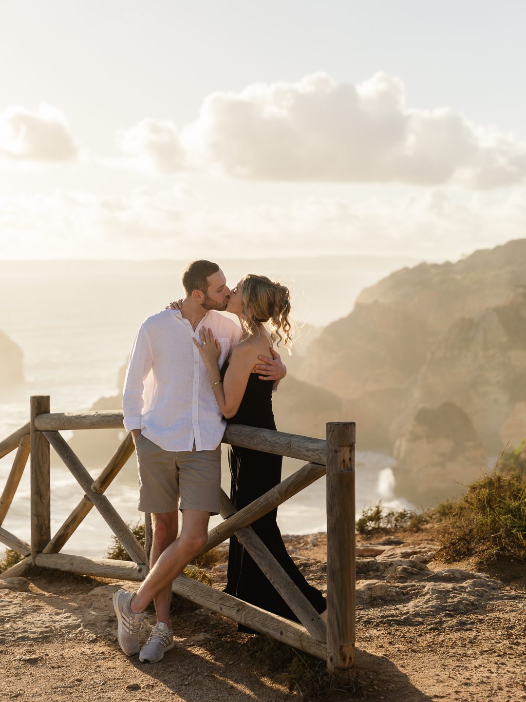 Playful beach engagement session in the Algarve after a surprise proposal 