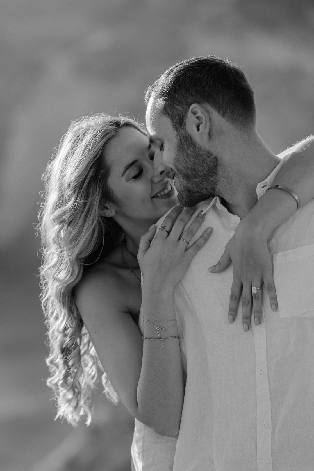 Candid engagement photography capturing genuine emotion on the Algarve coast 
