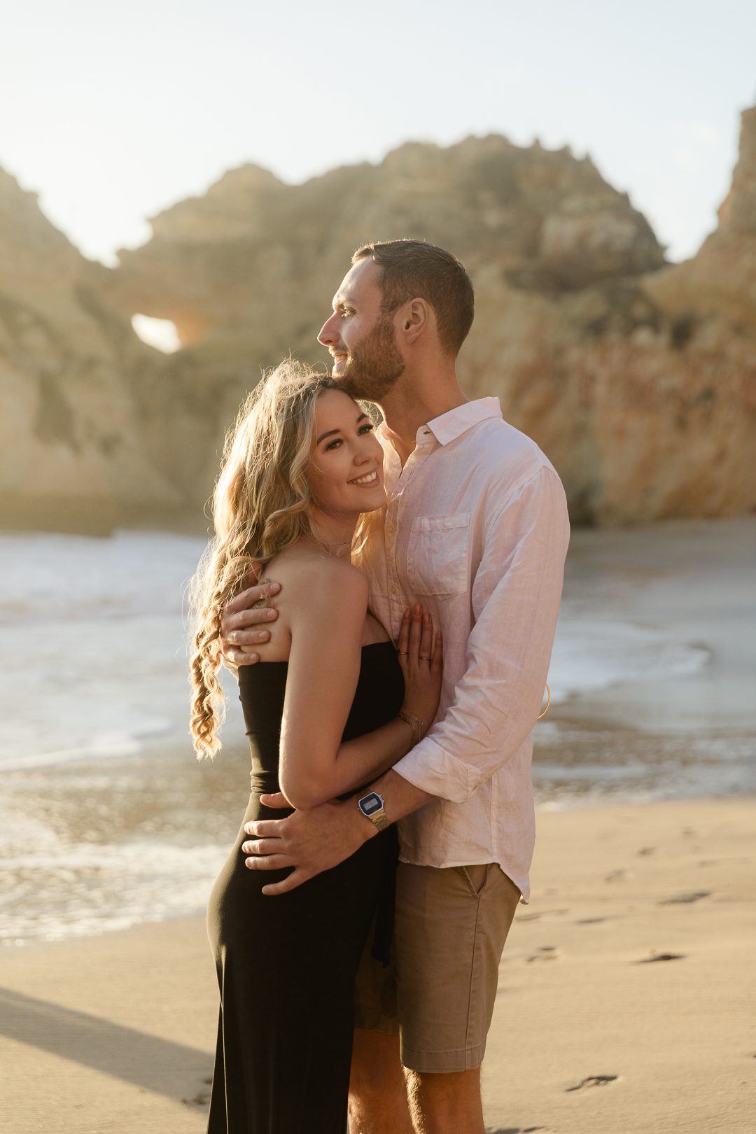 Candid engagement photography capturing genuine emotion on the Algarve coast 