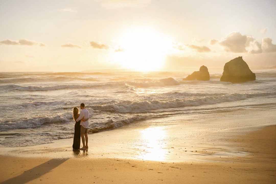Candid engagement photography capturing genuine emotion on the Algarve coast 