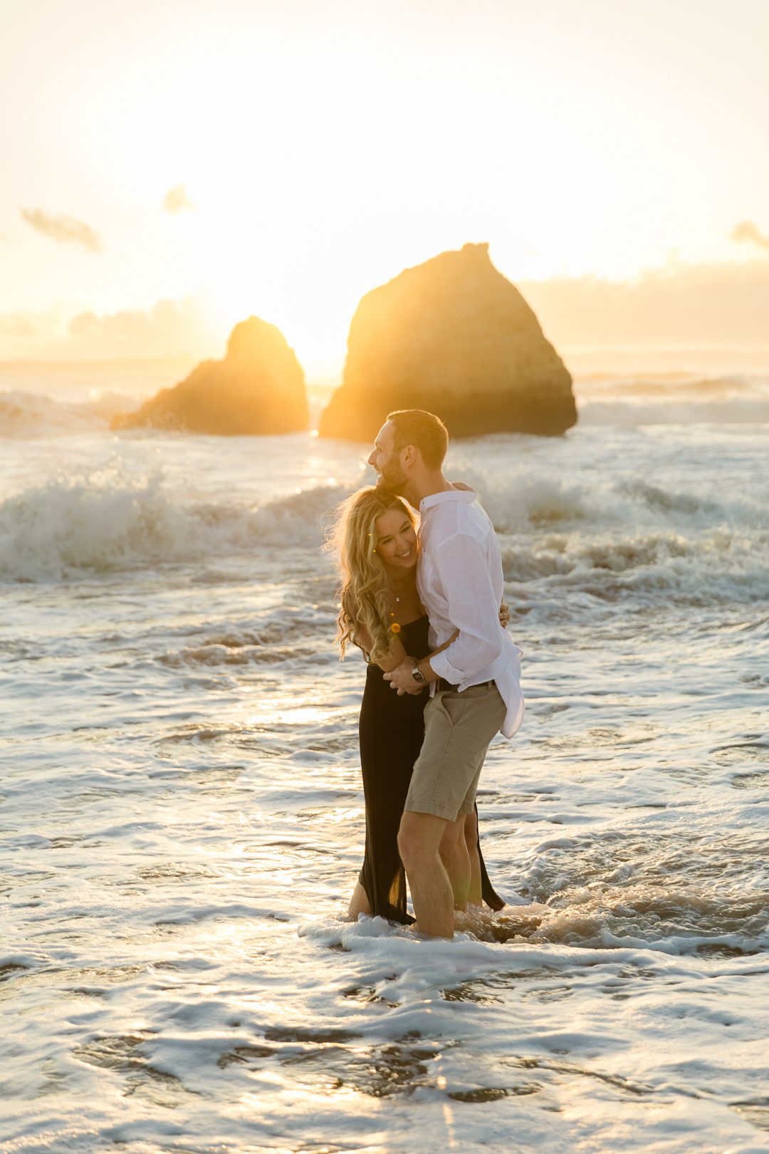 Fun and relaxed destination engagement session on the beach in Portugal 