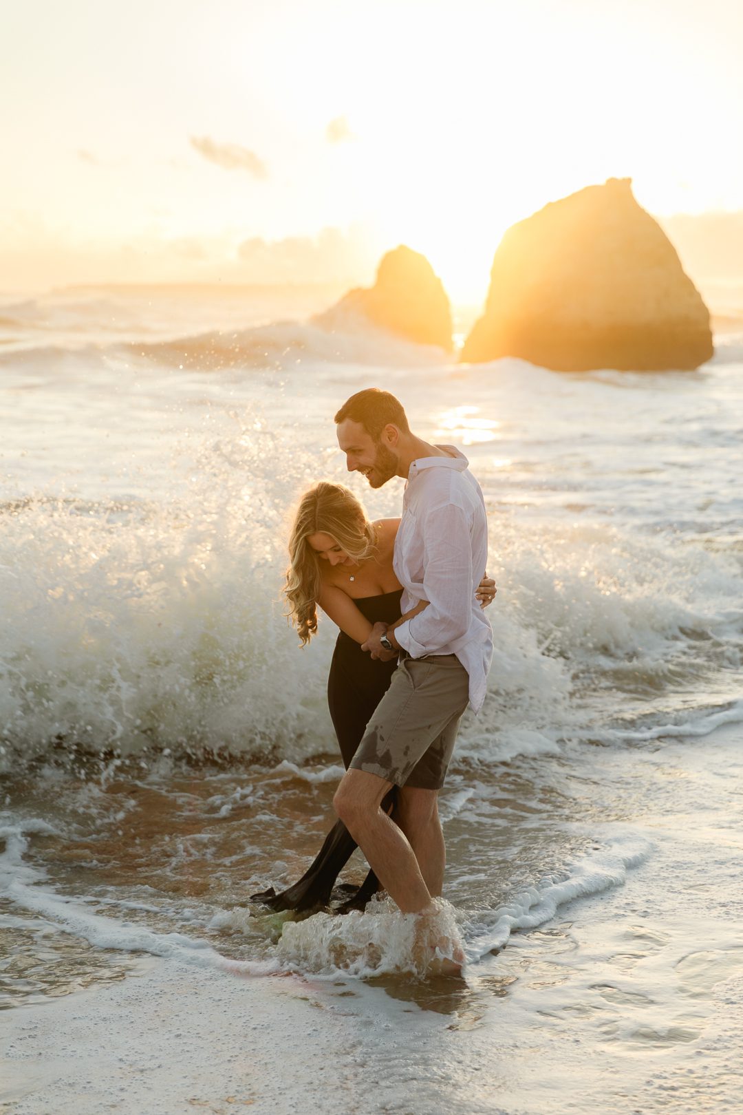 Fun and relaxed destination engagement session on the beach in Portugal 