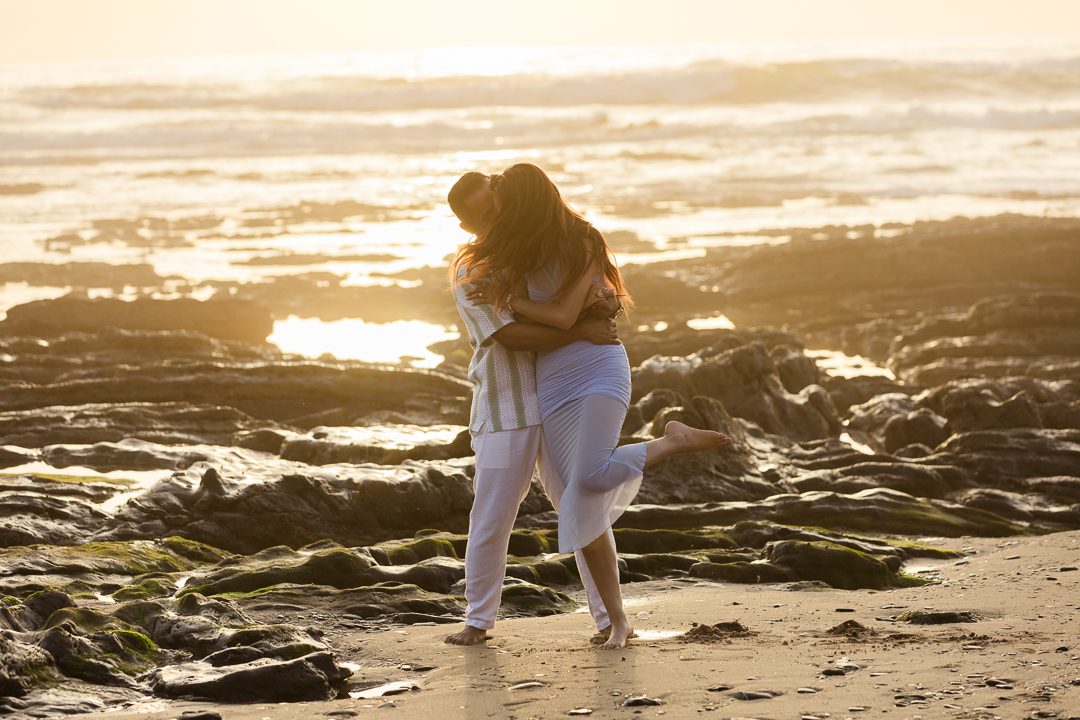 destination couple shoot algarve Portugal ocean cliffs sunset