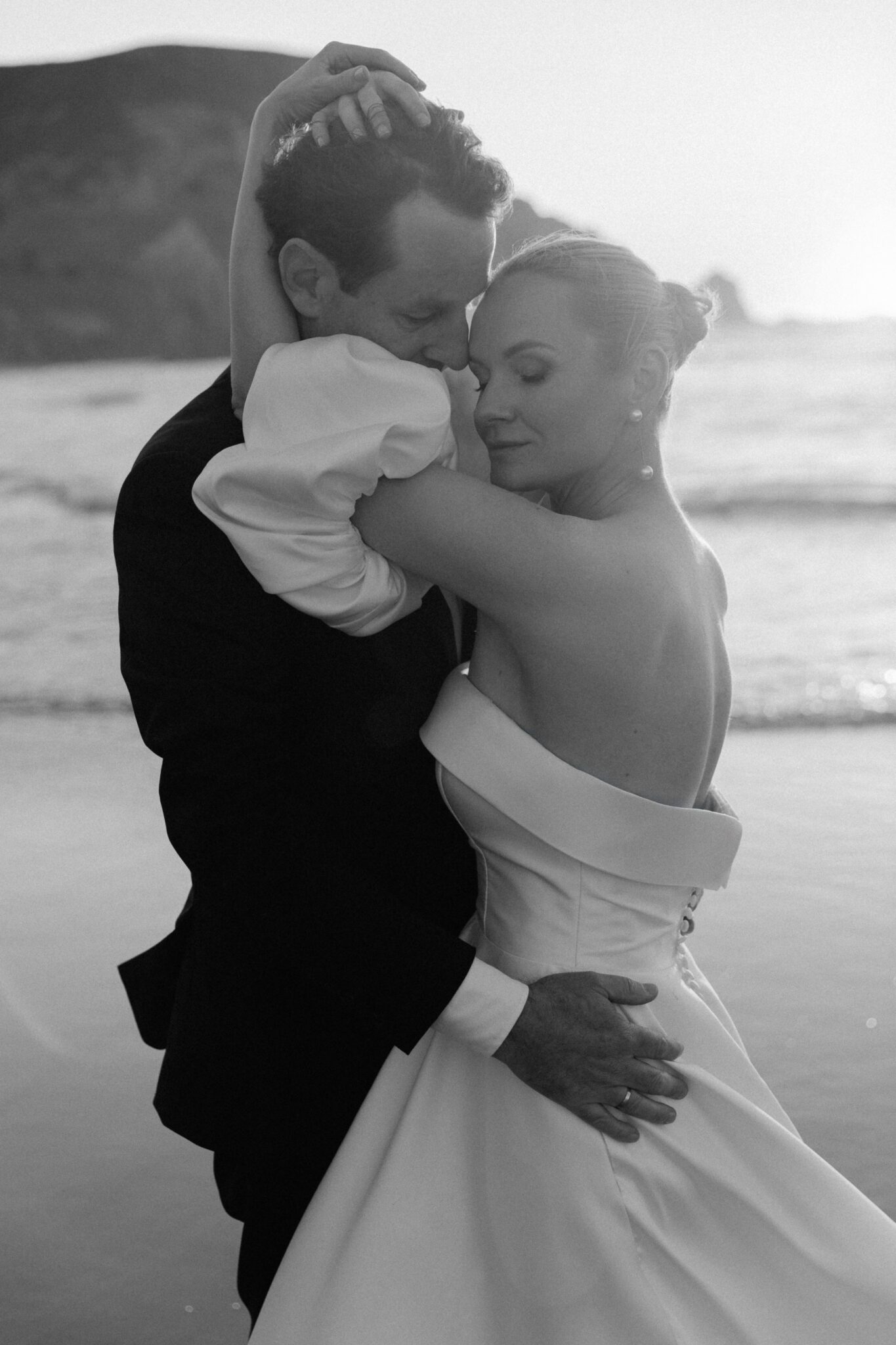 Bride and Groom on a wild beach in Portugal
