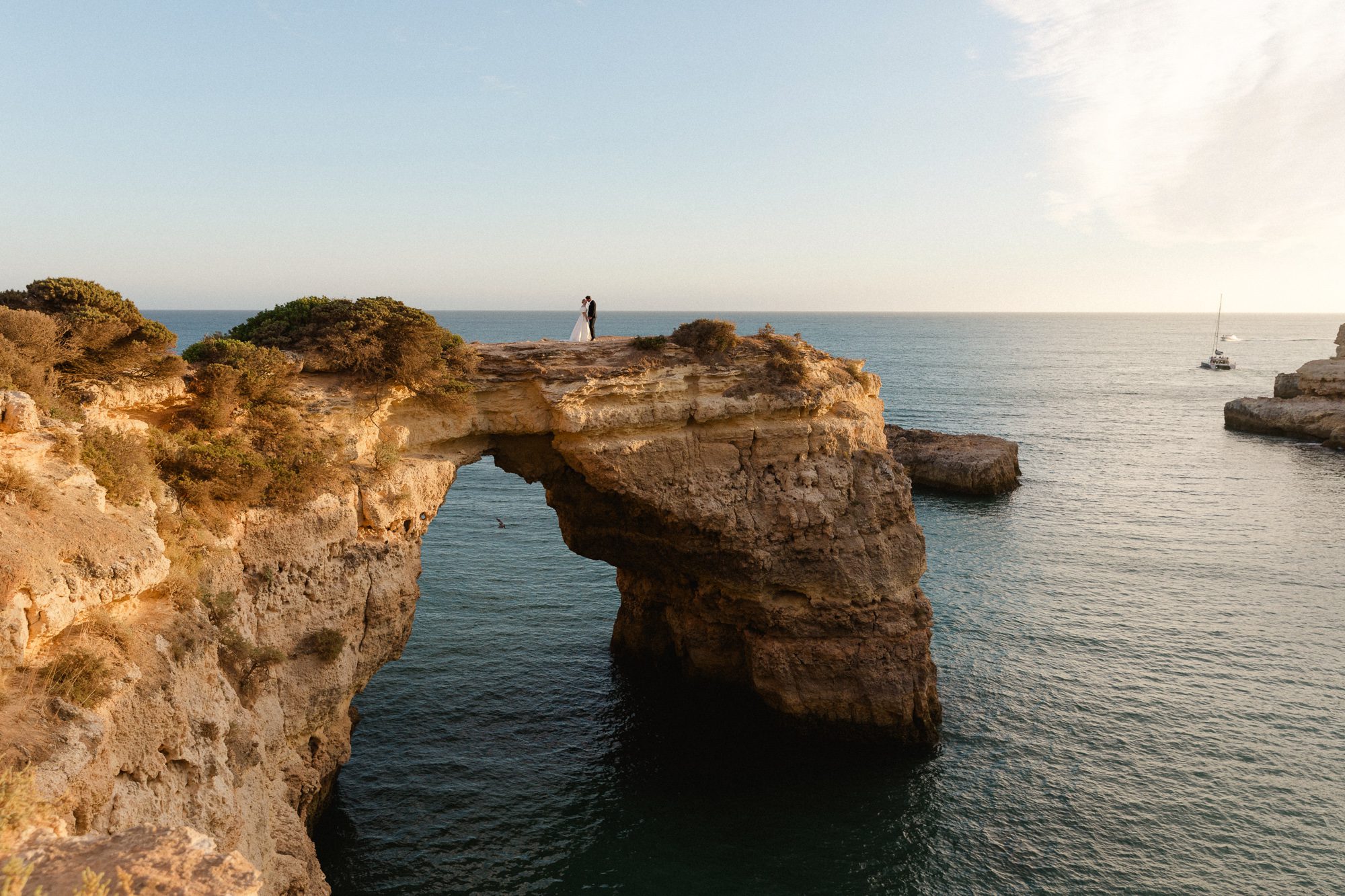Bride and groom during an intimate clifftop ceremony in the Algarve, Portugal
