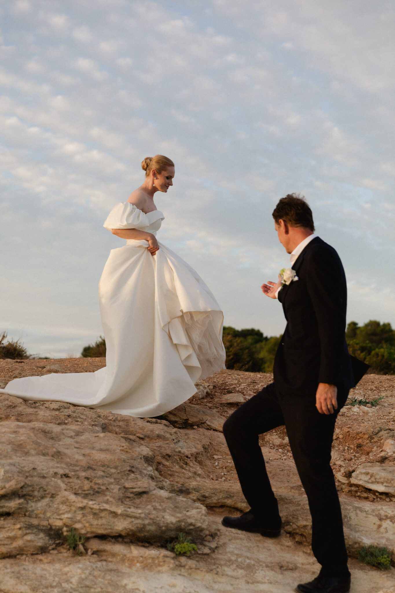 Bride in a romantic wedding gown and vail during an Algarve elopement ceremony
