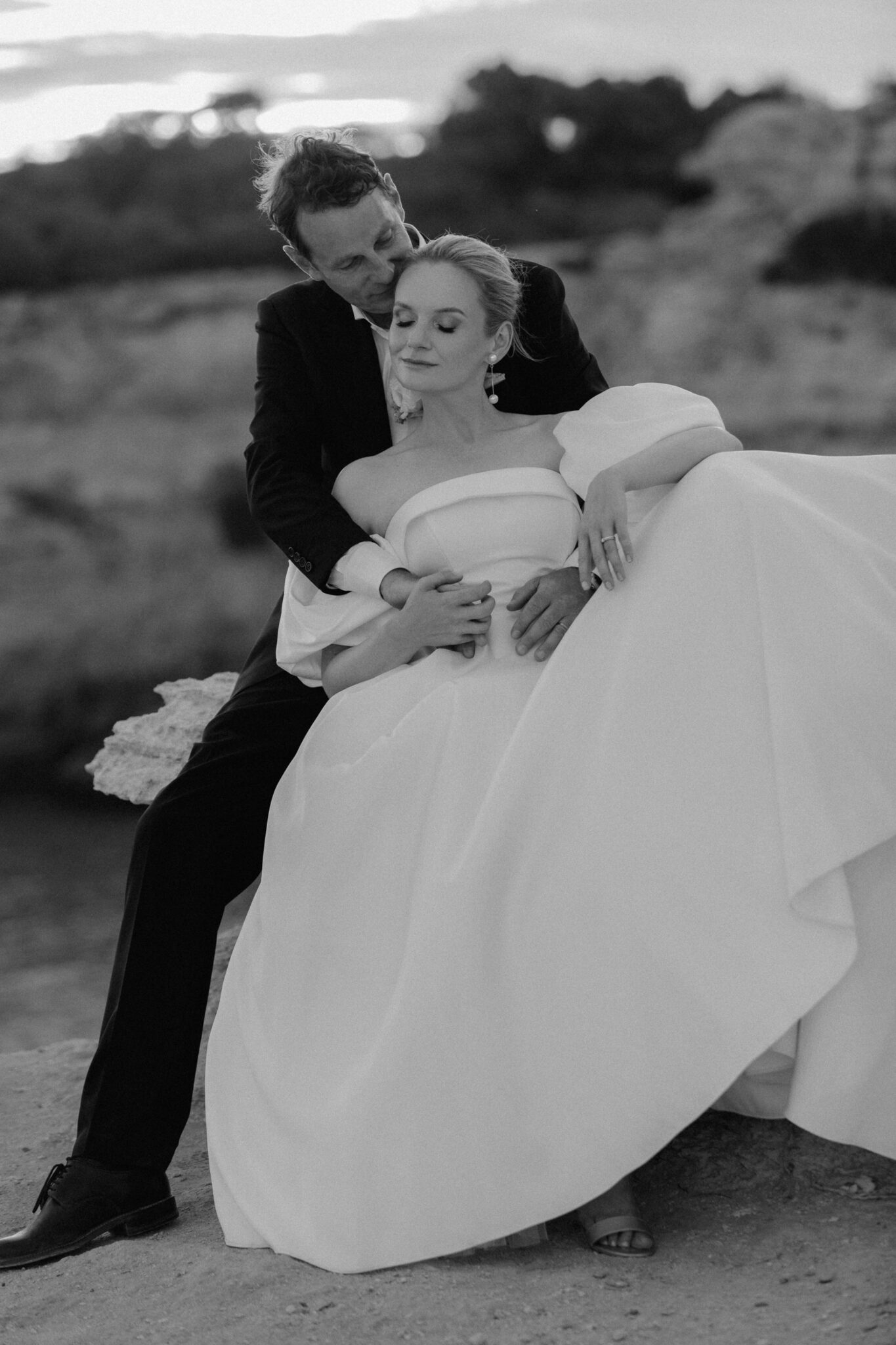 Bride and groom during an intimate clifftop ceremony in the Algarve, Portugal
